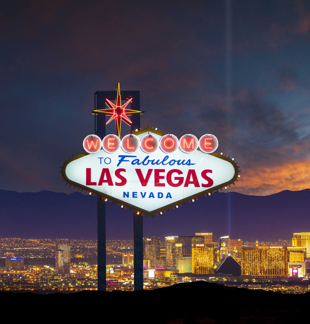 107107530-1661196258368-gettyimages-954500850-las_vegas_sign_panoramic_sunset_01