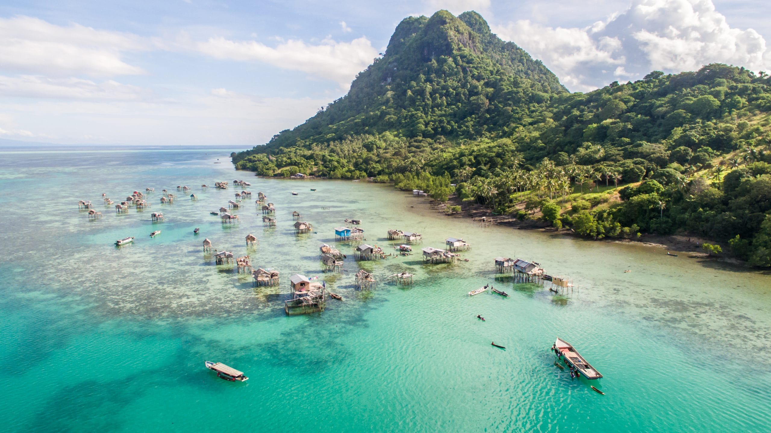 beautiful-aerial-view-borneo-sea-gypsy-water-village-in-mabu_shutterstock_1253718121-scaled
