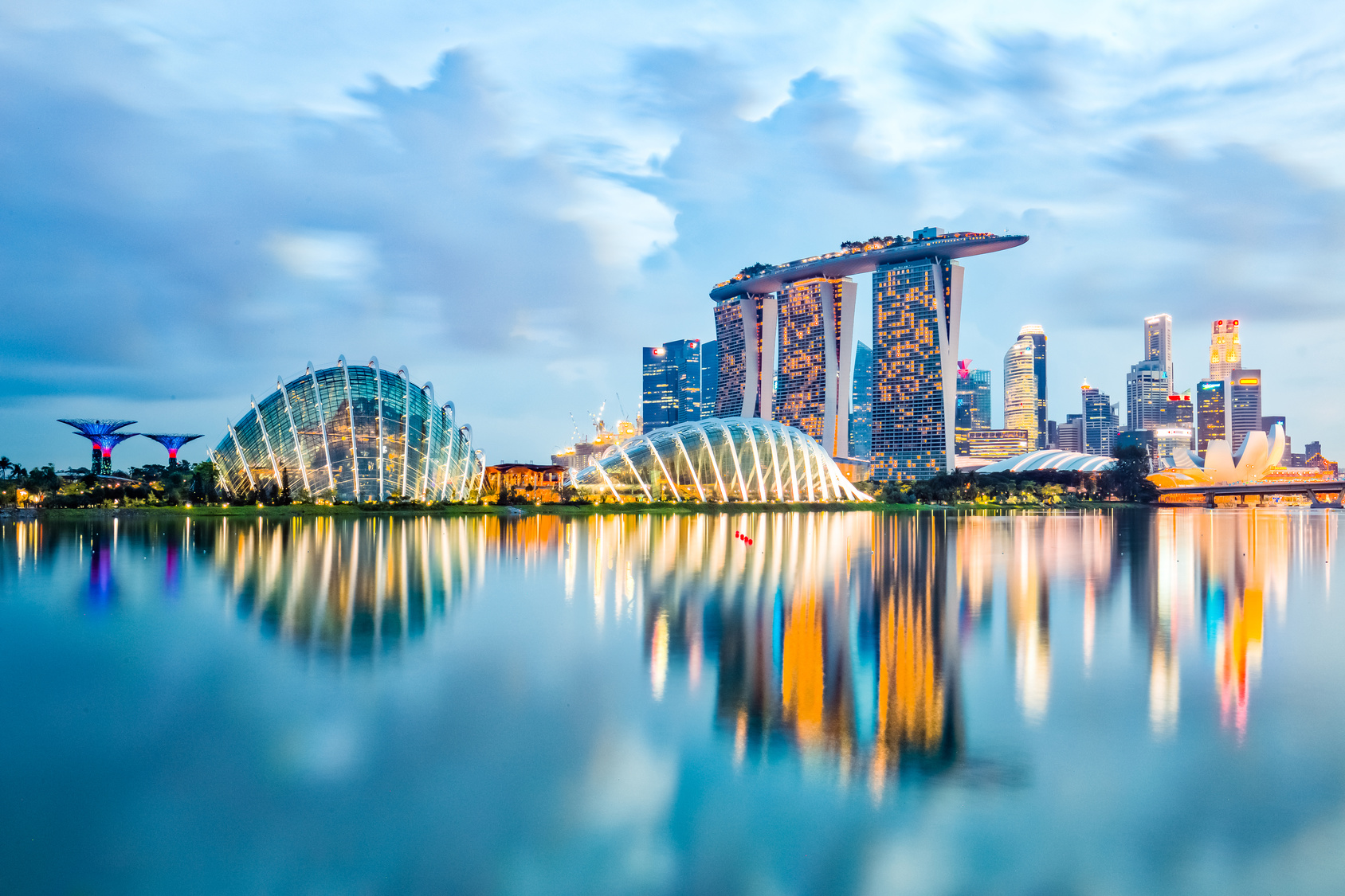 Singapore City, Singapore - July 17, 2015: Marina Bay is a bay near Central Area in the southern part of Singapore, and lies to the east of the Downtown Core. The area surrounding the bay itself, also called Marina Bay